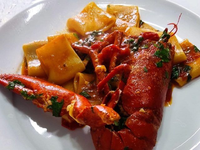 Pasta with lobster in a tomato sauce
